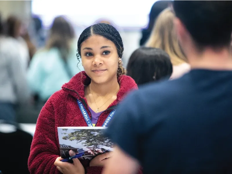 Student looking at someone smiling